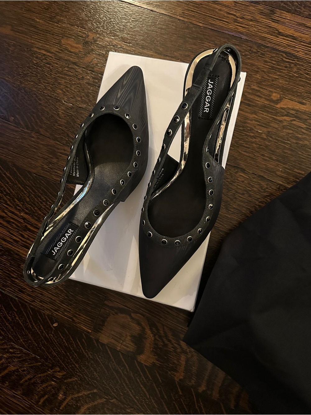 JAGGAR Black Pointed Slingback Flats with Eyelet Accents